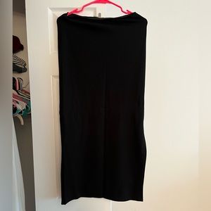 Long black skirt with a slit